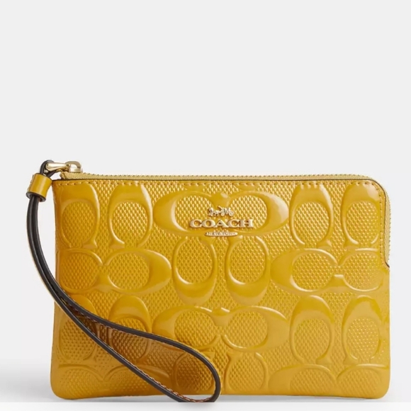 Coach Handbags - Corner Zip In Signature Leather